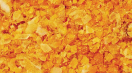 Close-up of Grade 1 golden-yellow corn DDGS for poultry and aquaculture feed showing high xanthophyll levels and optimal lysine digestibility