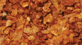 Grade 4 medium brown DDGS with elevated CDS syrup content, higher fat and phosphorus for finishing beef cattle